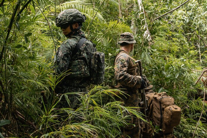 U.S. Marines with 2nd Battalion, 1st Marine Regiment, Marine Rotational Force – Darwin 25.3, I Marine Expeditionary Force Forward, and Philippine Marines with 3rd Brigade set security during KAMANDAG 9 at Oyster Bay, Palawan, Philippines, June 11, 2025. KAMANDAG is an annual Philippine Marine Corps and U.S. Marine Corps-led exercise aimed at enhancing the Armed Forces of the Philippines’ defense and humanitarian capabilities by providing valuable training in combined operations with foreign militaries in the advancement of a Free and Open Indo-Pacific. MRF-D is an annual six-month rotational deployment to enhance interoperability with the Australian Defence Force and allies and partners and provide a forward postured crisis response force in the Indo-Pacific. (U.S. Marine Corps photo by Cpl. Anita Ramos)