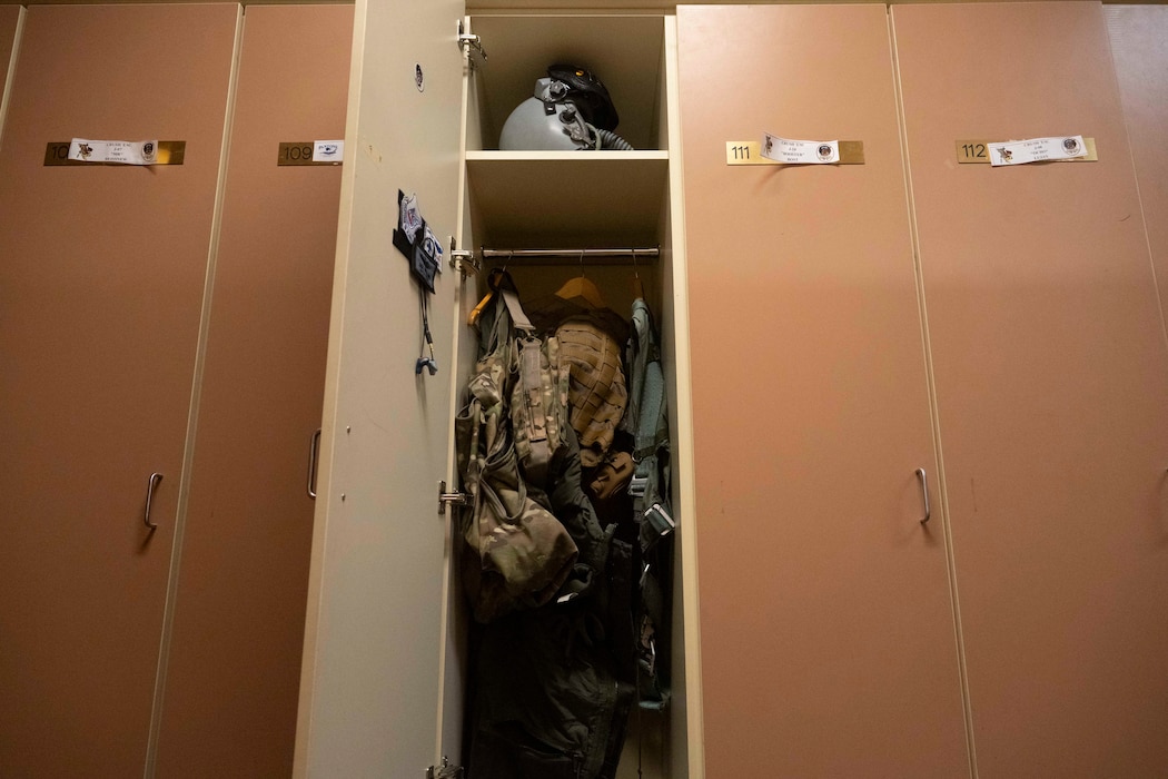Flight suit equipment sits in a wall locker in the Aircrew Flight Equipment office during Red Flag-Alaska 25-2 at Eielson Air Force Base, Alaska, June 16, 2025.