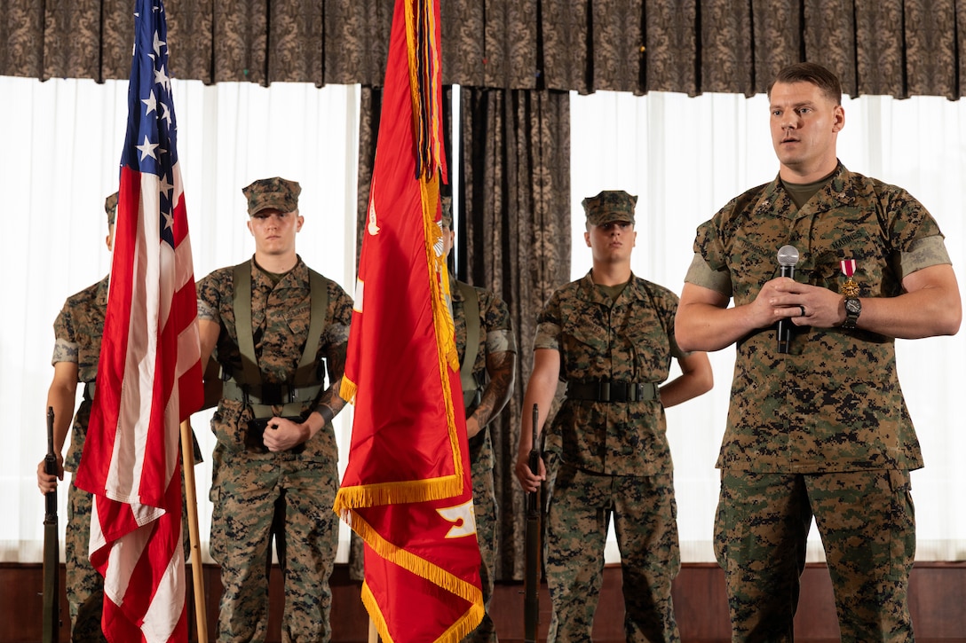 U.S. Marine Corps Lt. Col. Taylor Thompson, the outgoing commanding officer of 3rd Network Battalion, Marine Corps Cyberspace Operations Group, gives remarks during a change of command ceremony at Plaza Housing, Camp Foster, Okinawa, Japan, June 6, 2025. Thompson served for two years as the commanding officer and was relieved by Chamberlin who previously served as the assistant chief of staff G-6, MCIPAC. Thompson also received his second meritorious service medal for his service as commanding officer. Thompson is a native of Tennessee. (U.S. Marine Corps photo by LCpl. Joseph Kreis)