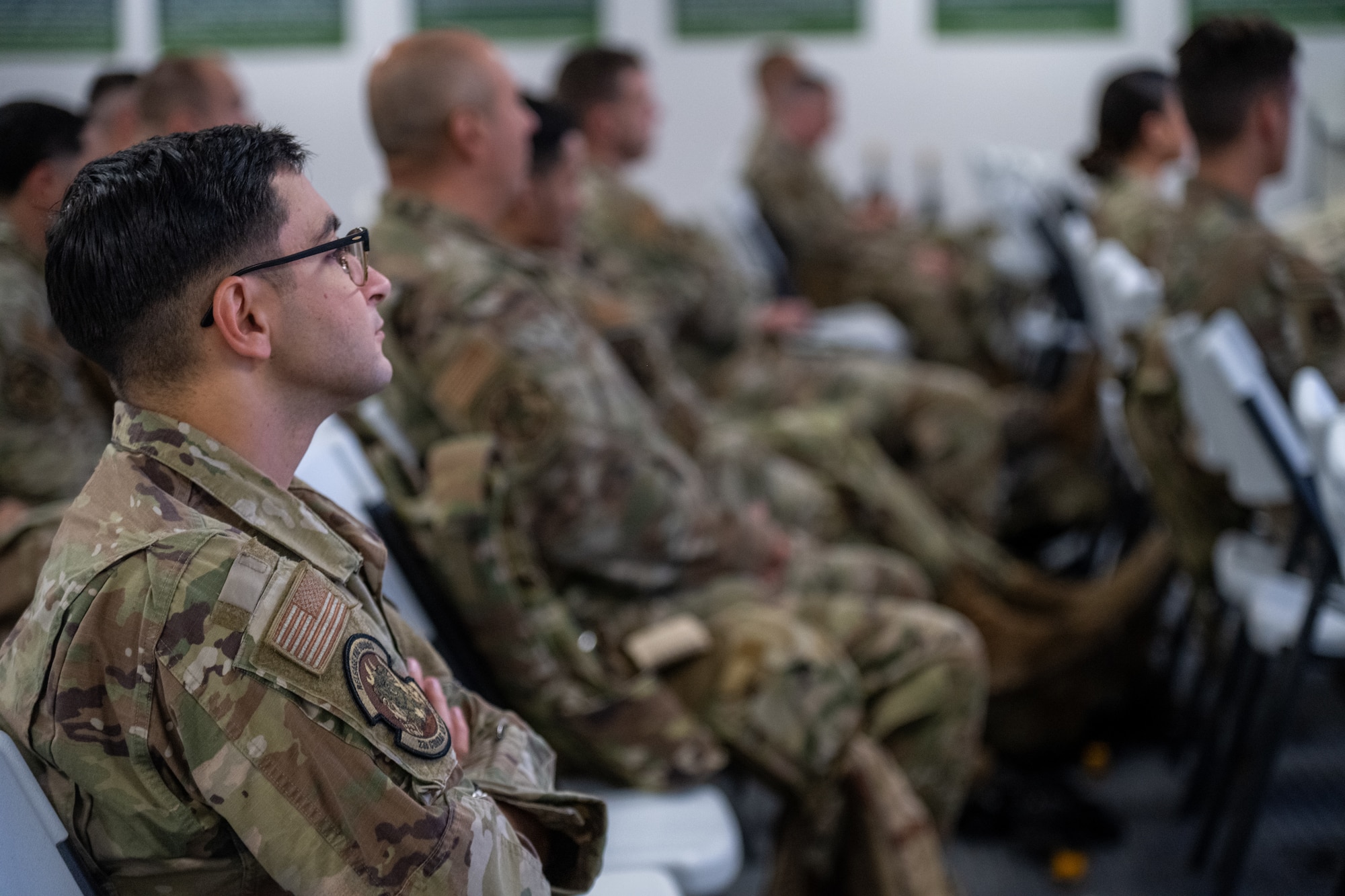 Airmen assigned to the 23d Air Task Force and 23d Combat Air Base Squadron receive a cultural briefing during an expeditionary skills exercise at Fort Bliss, Texas, June 8, 2025.