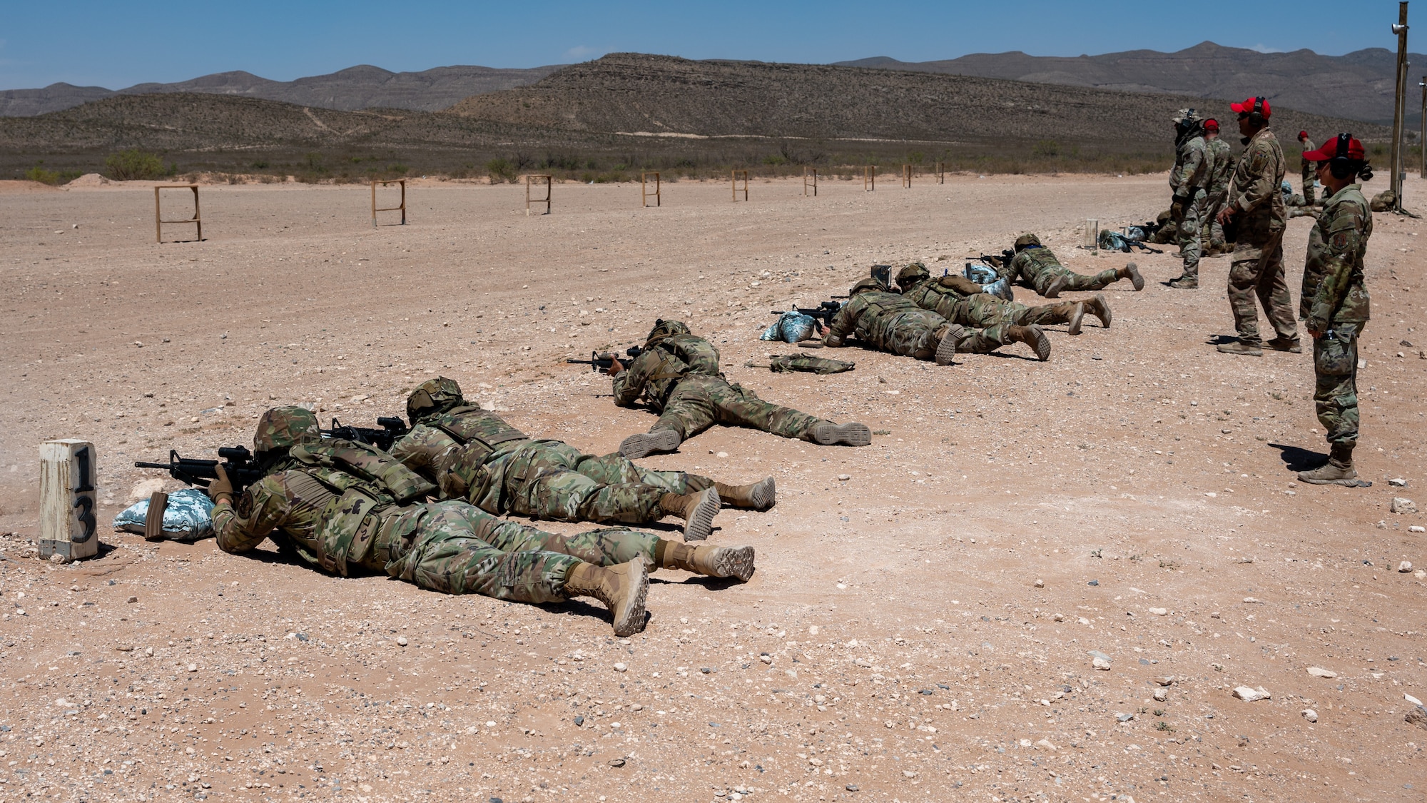 Airmen assigned to the 23d Air Task Force and 23d Combat Air Base Squadron receive live fire range training during an expeditionary skills exercise at Fort Bliss, Texas, June 9, 2025.