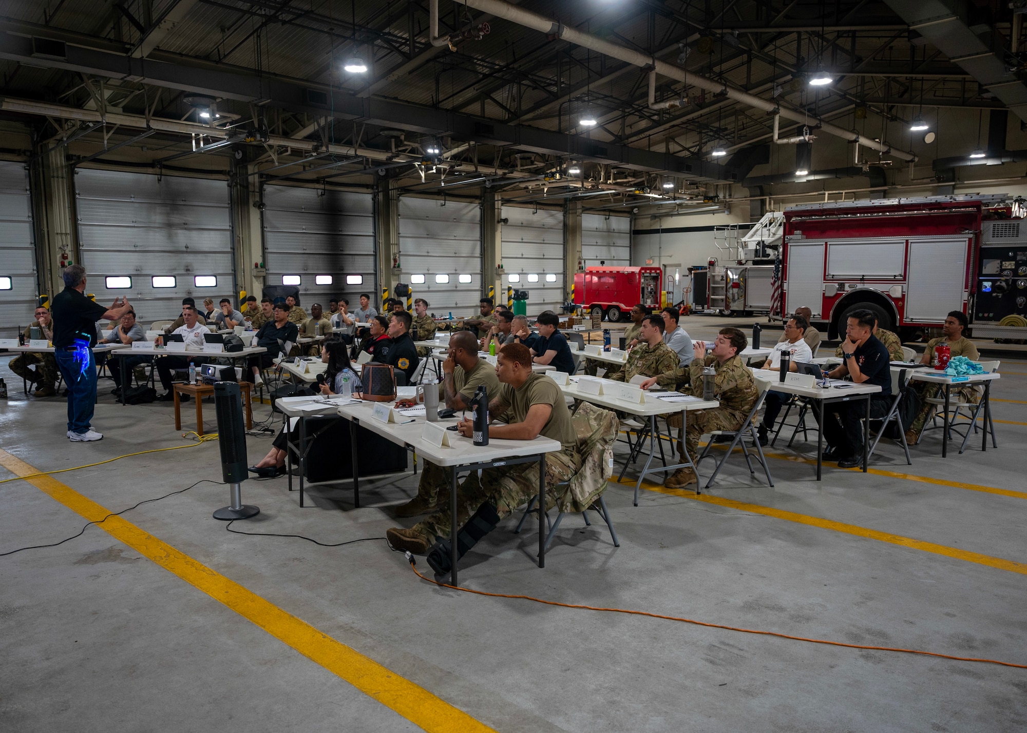U.S. and Republic of Korea firefighters participate in Osan’s first bilingual InSource Consulting Fire Training at Osan Air Base, Republic of Korea, June 18, 2025. The three-day course brought together 42 participants from the U.S. and Republic of Korea, local Korean fire departments, and emergency personnel from Kunsan Air Base, Camp Humphreys, and the cities of Songtan and Daegu. (U.S. Air Force photo by Staff Sgt. Sarah Williams)