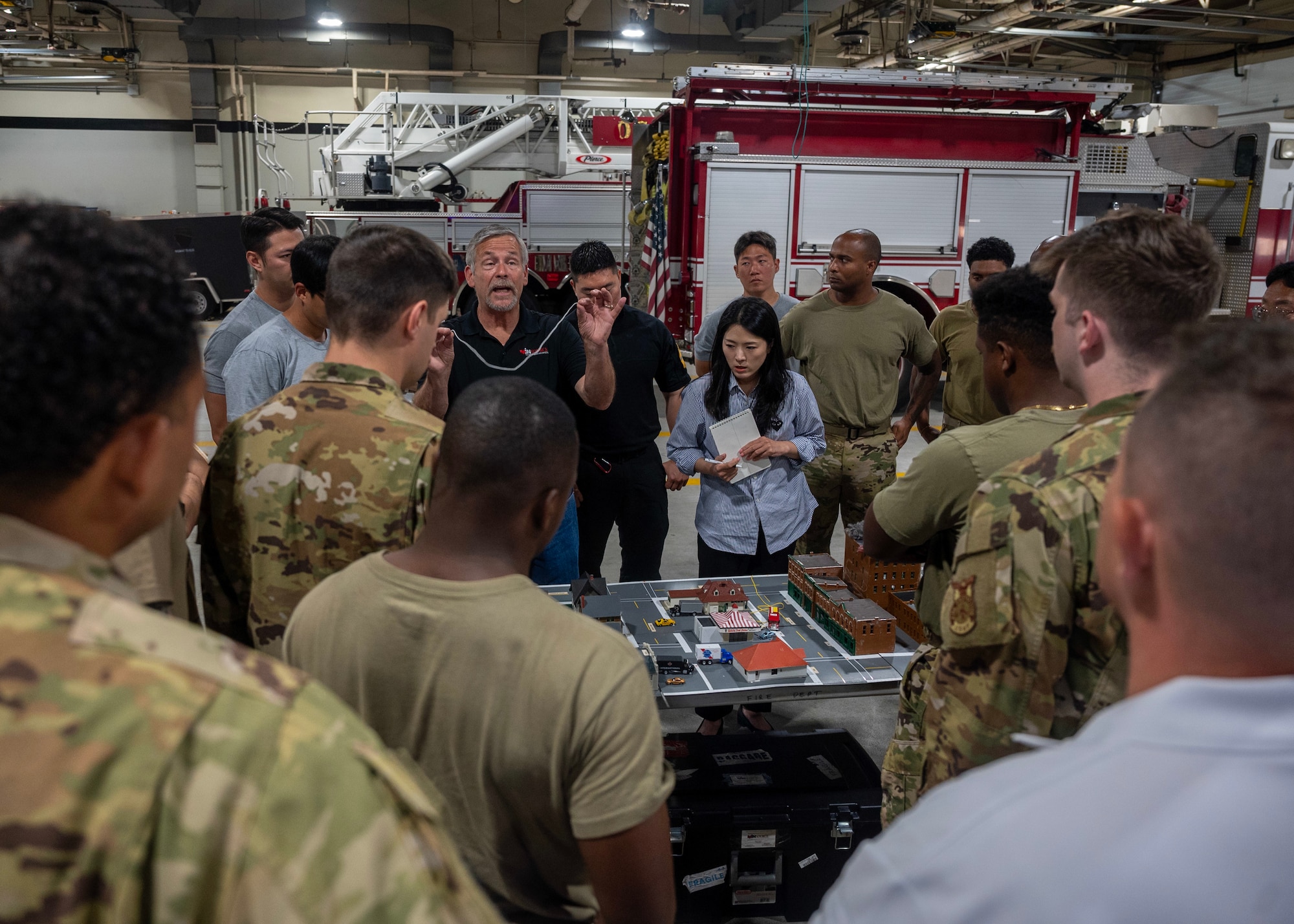 Brett Stohr, InSource Fire Training president, teaches communication strategies during Osan’s first bilingual InSource Consulting Fire Training at Osan Air Base, Republic of Korea, June 18, 2025. The course unified approaches to emergency response, laying the groundwork for faster, more coordinated operations during crises that involve both U.S. and Korean jurisdictions. (U.S. Air Force photo by Staff Sgt. Sarah Williams)