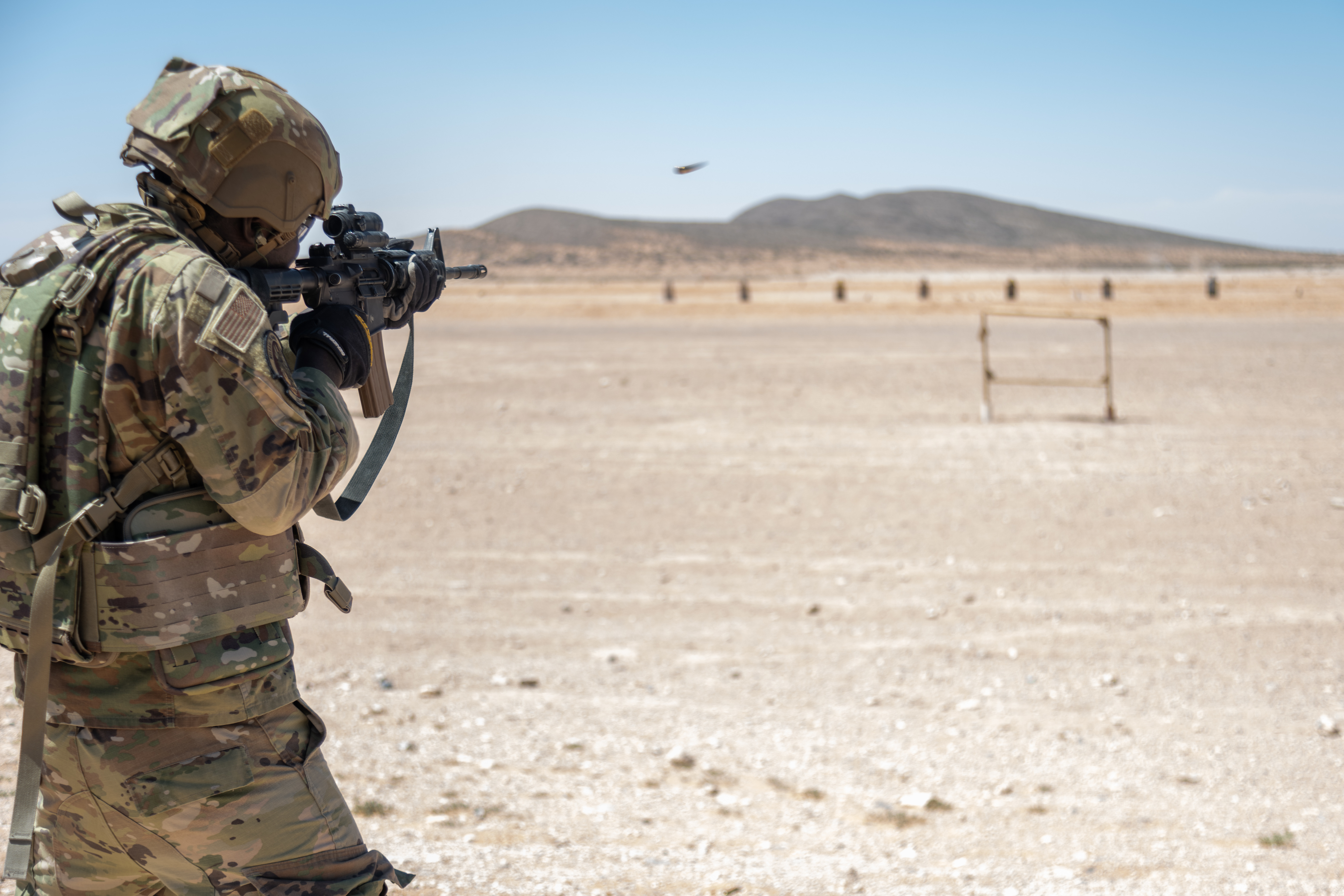 Airmen assigned to the 23d Air Task Force and 23d Combat Air Base Squadron receive live fire range training during an expeditionary skills exercise at Fort Bliss, Texas, June 9, 2025. The Combat Air Base Squadrons are the Air Task Force’s primary base operation support element and provide sustainment, protection, and/or airfield management. (U.S. Air Force photo by 2nd Lt. Jason Pannell)