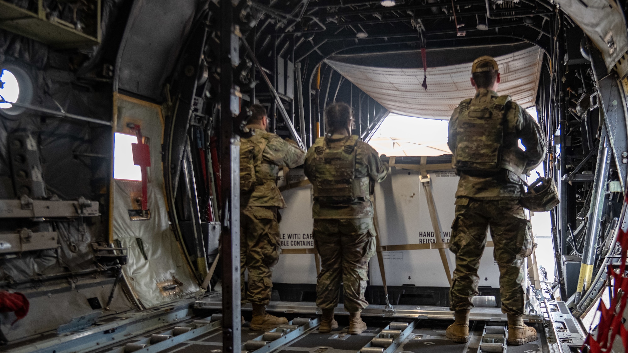 Airmen assigned to the 23d Combat Air Base Squadron demonstrate aircraft cargo loading and unloading procedures for fellow Airmen during an expeditionary skills exercise at Fort Bliss, Texas, June 10, 2025.