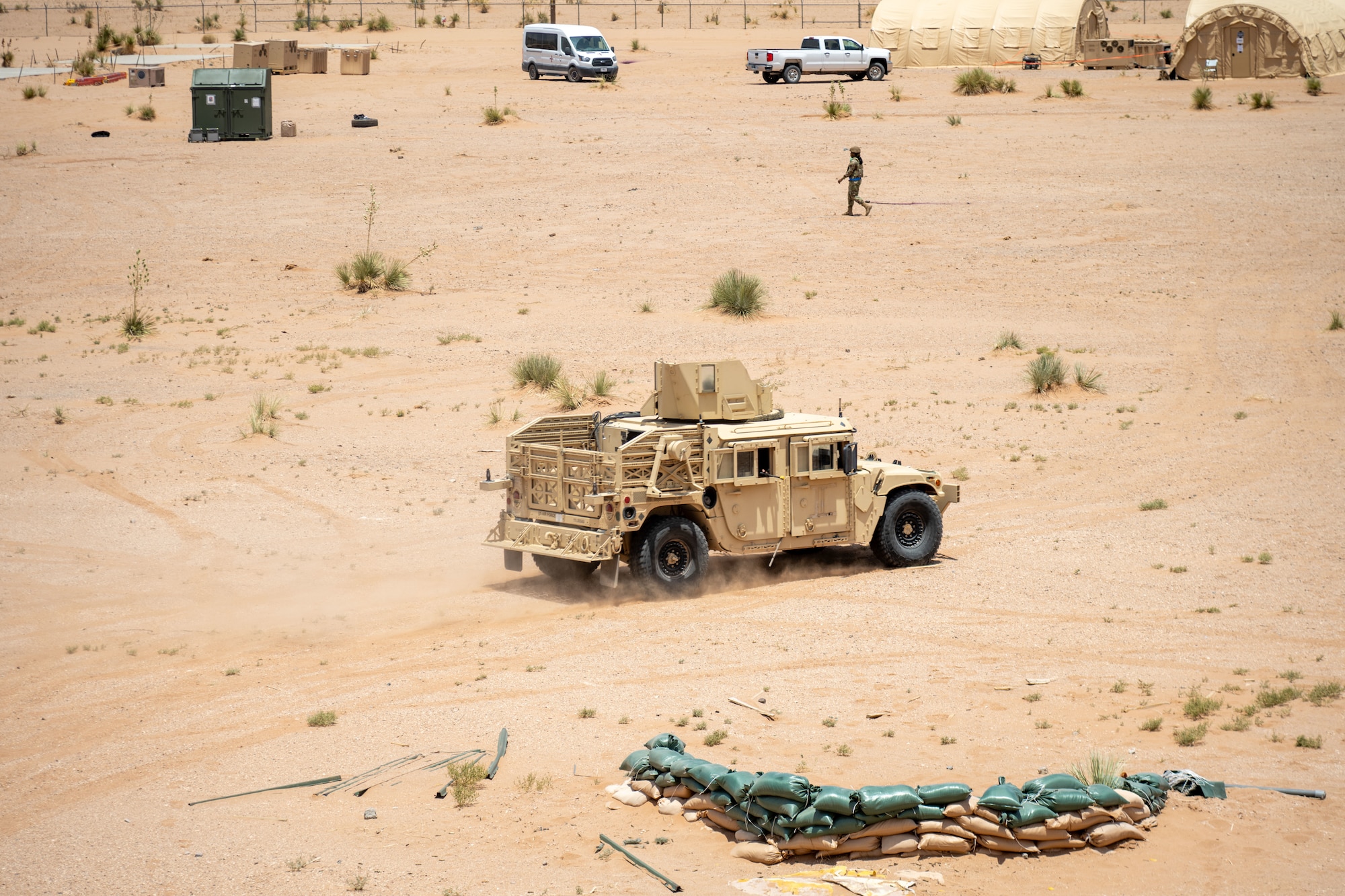 Airmen assigned to the 23rd Air Task Force operate military defense vehicles to repel simulated enemy attacks during an expeditionary skills exercise at Fort Bliss, Texas, June 16, 2025.
