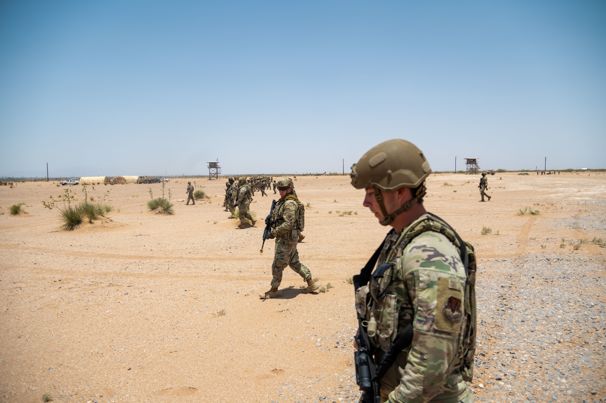 Airmen assigned to the 23d Air Task Force conduct a post-attack reconnaissance sweep during an expeditionary skills exercise at Fort Bliss, Texas, June 16, 2025.