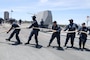 Sailors aboard the Arleigh Burke-class guided-missile destroyer USS John Finn (DDG 113) take in a line on the fo’c’sle during a sea and anchor detail in Yokosuka, Japan, June 21. The John Finn is forward-deployed and assigned to Destroyer Squadron (DESRON) 15, the Navy’s largest DESRON and the U.S. 7th Fleet’s principal surface force. (U.S. Navy photo by Mass Communication Specialist 2nd Class Alexandria Esteban)