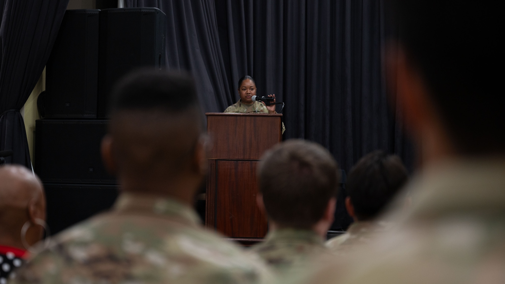 U.S. Air Force Lt. Col. Annabelle Hill, outgoing 51st Force Support Squadron commander, delivers farewell remarks during a Change of Command ceremony at Osan Air Base, Republic of Korea, June 24, 2025. The 51st FSS is comprised of five flights and operates 55 combat support community service activities across 100 facilities and recreational functions at Osan. (U.S. Air Force photo by Senior Airman Rome Bowermaster)