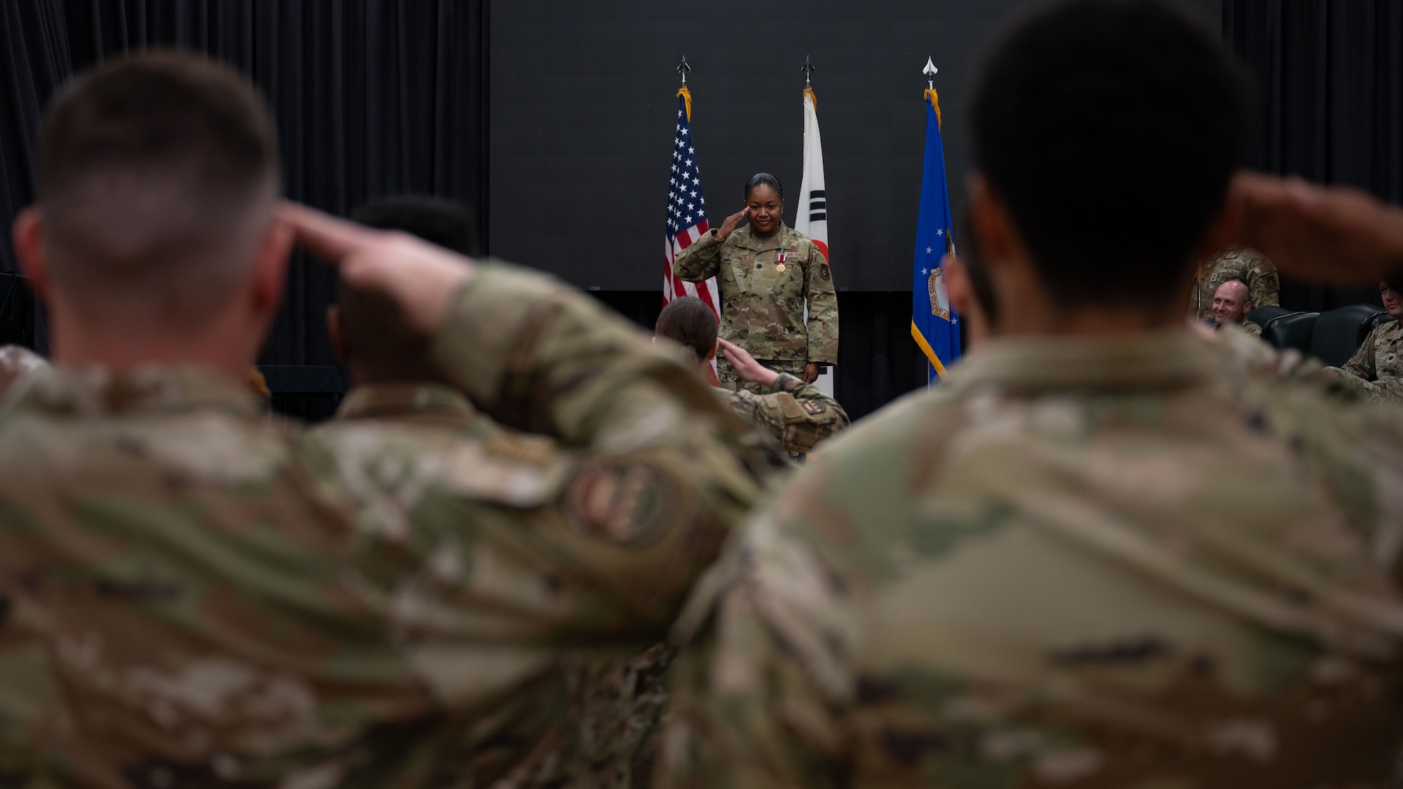 U.S. Air Force Lt. Col. Annabelle Hill, outgoing 51st Force Support Squadron commander, renders her final salute at Osan Air Base, Republic of Korea, June 24, 2025. The 51st FSS supports over 6,000 service members and their families living on Osan through businesses, programs, and services. (U.S. Air Force photo by Senior Airman Rome Bowermaster)