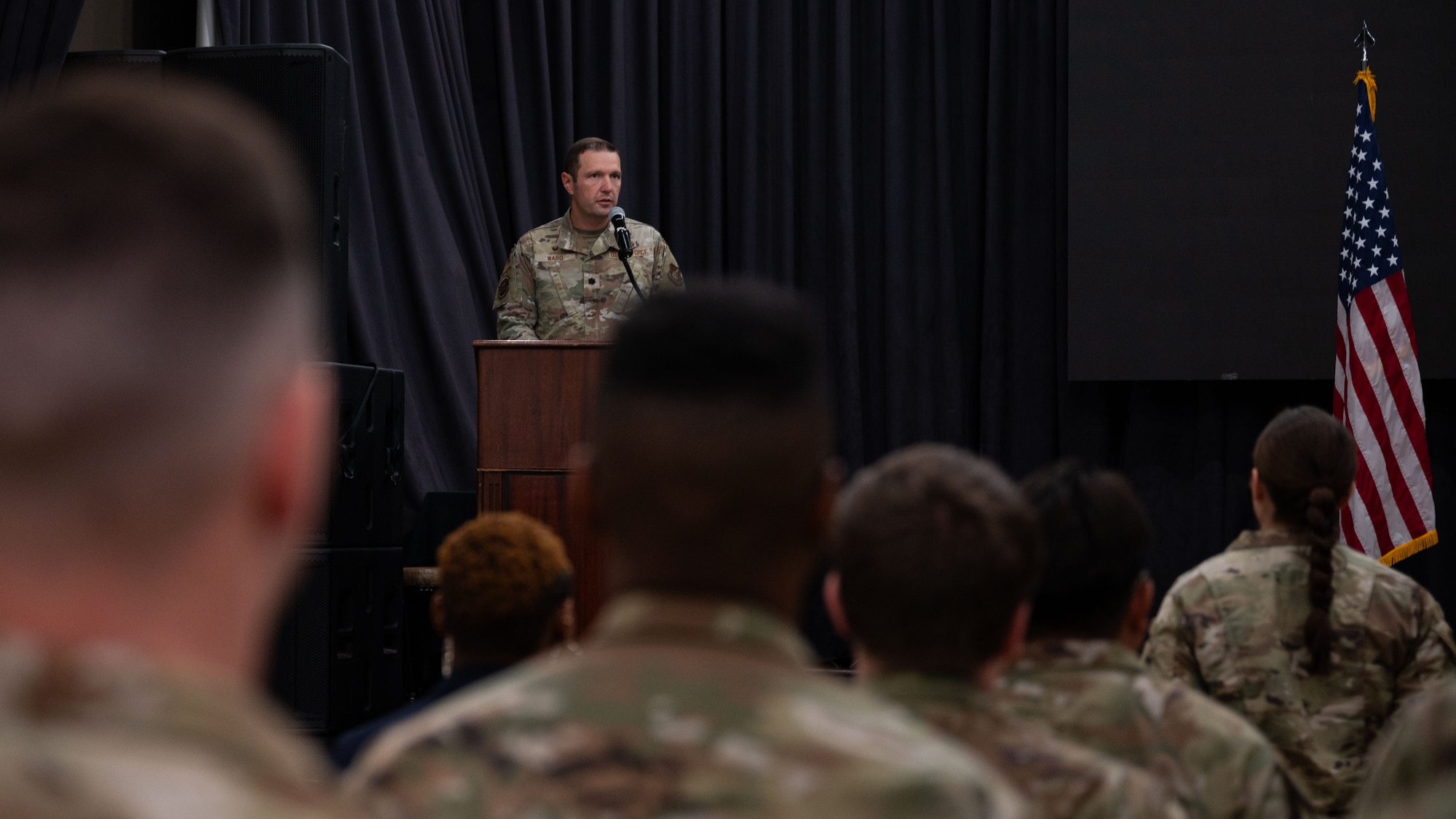 U.S. Air Force Lt. Col. Edmund Ward, incoming 51st Force Support Squadron commander, addresses the squadron during a Change of Command ceremony at Osan Air Base, Republic of Korea, June 24, 2025. Prior to assuming command, Ward led over 130 military and civilian personnel whose primary mission is to enhance Total Force readiness and resiliency for the 6,000 Airmen and Guardians of Hickam Air Force Base, Hawaii. (U.S. Air Force photo by Senior Airman Rome Bowermaster)