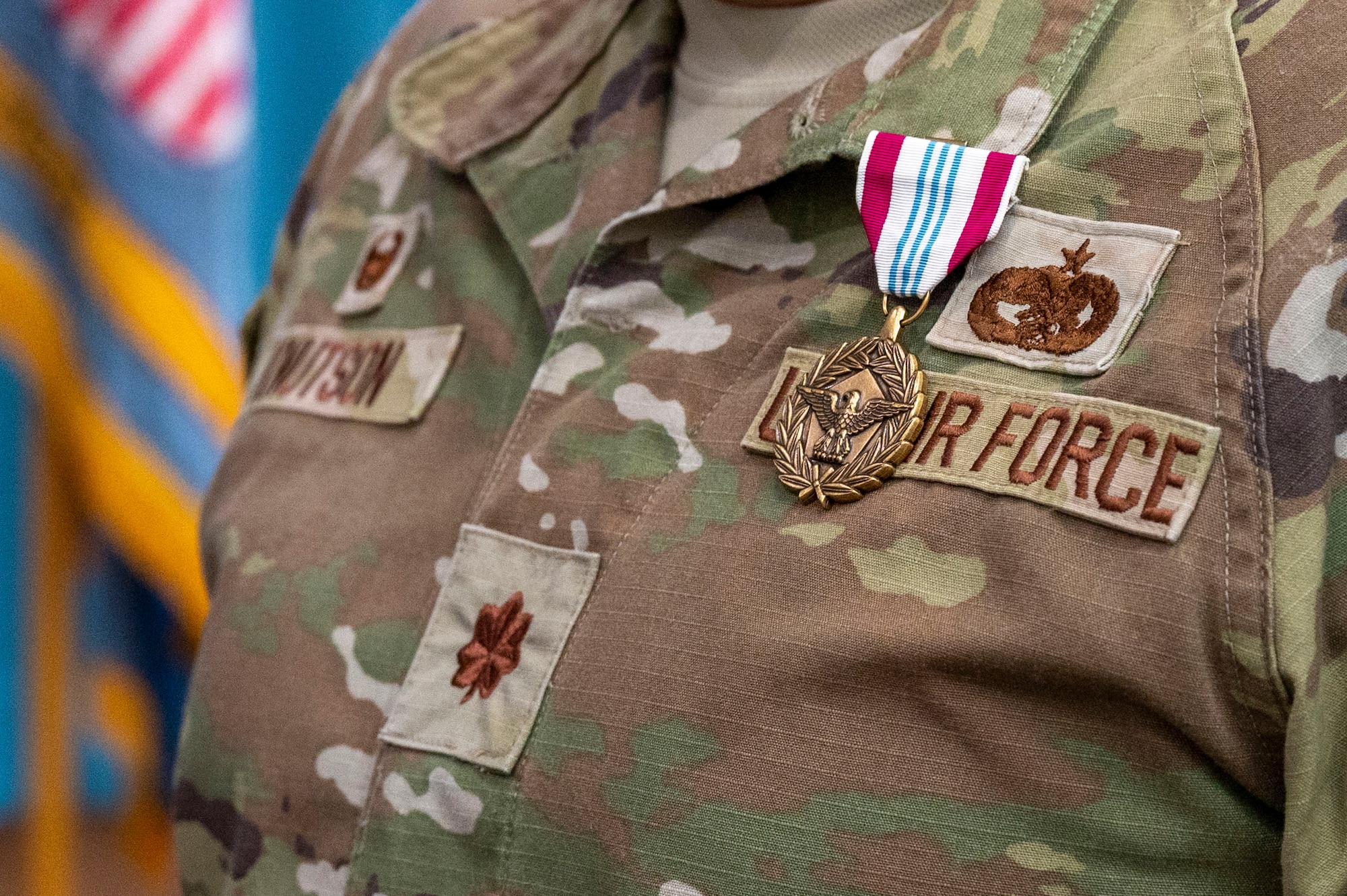 A meritorious service medal rests on the uniform of U.S. Air Force Maj. Kevin Knutson, Defense Logistics Agency Energy Okinawa outgoing commander, during a change of command ceremony at Kadena Air Base, Japan, June 18, 2025