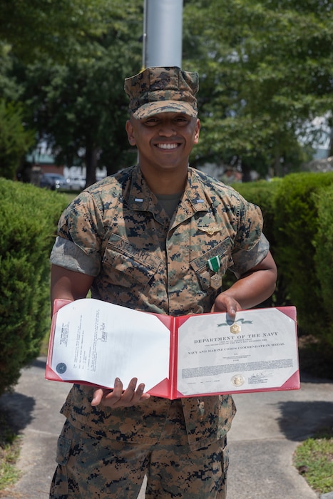 U.S. Marine Corps 1st Lt. Willie Stewart, from Colorado, a CH-53E Super Stallion student pilot with Marine Heavy Helicopter Training Squadron (HMHT) 302, poses for a photo during an award ceremony at Marine Corps Air Station New River, North Carolina, June 17, 2025. Stewart received the Navy and Marine Corps Commendation Medal for providing lifesaving immediate medical treatment and coordinating emergency medical care for a driver after a vehicle crash on Interstate 95 in Virginia on May 17, 2025. (U.S. Marine Corps photo by Lance Cpl. Bryan Giraldo)