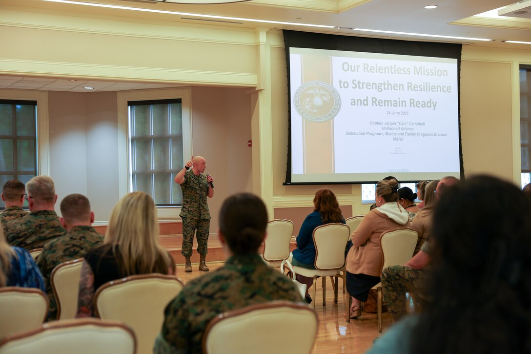U.S. Marine Corps Capt. Jergen Campbell, a Marine advisor for Suicide Prevention Capability, Headquarters Marine Corps, gives a presentation on relentlessness and resilience during the 2025 Suicide Prevention and Response Independent Review Committee (SPRIRC) implementation training at Marine Corps Base Camp Lejeune, North Carolina, June 24, 2025. The SPRIRC educates and trains command representatives and stakeholders across the MEF on ways to strengthen prevention efforts related to suicide and depression.  (U.S. Marine Corps photo by Cpl. Aydan Millette)