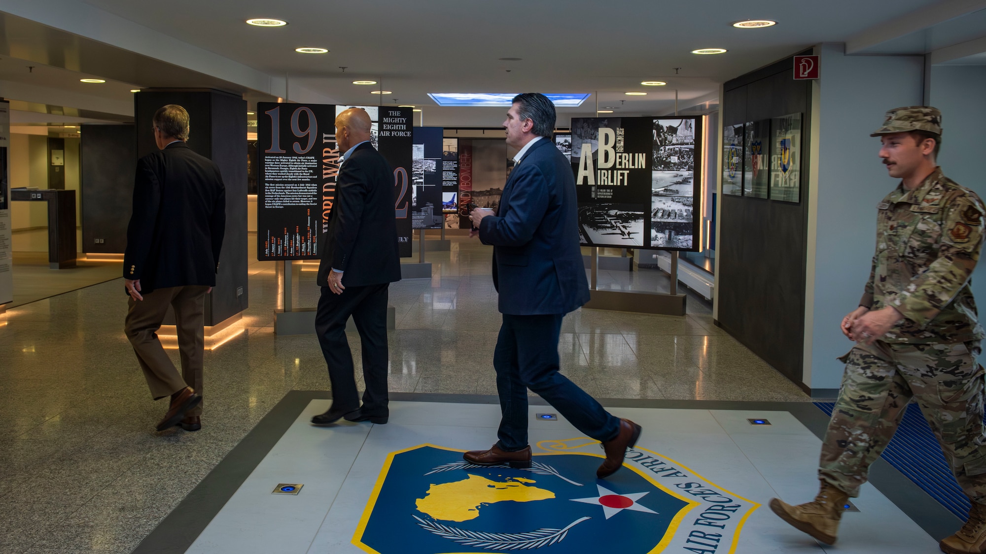 Delegation members tour building.