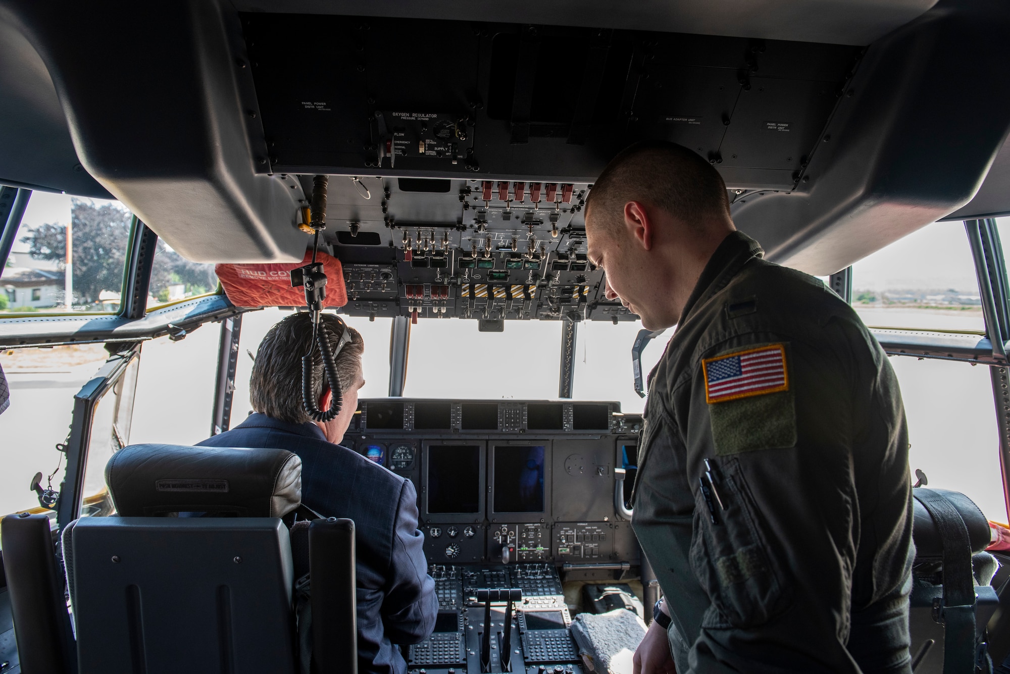 Delegates tour aircraft.