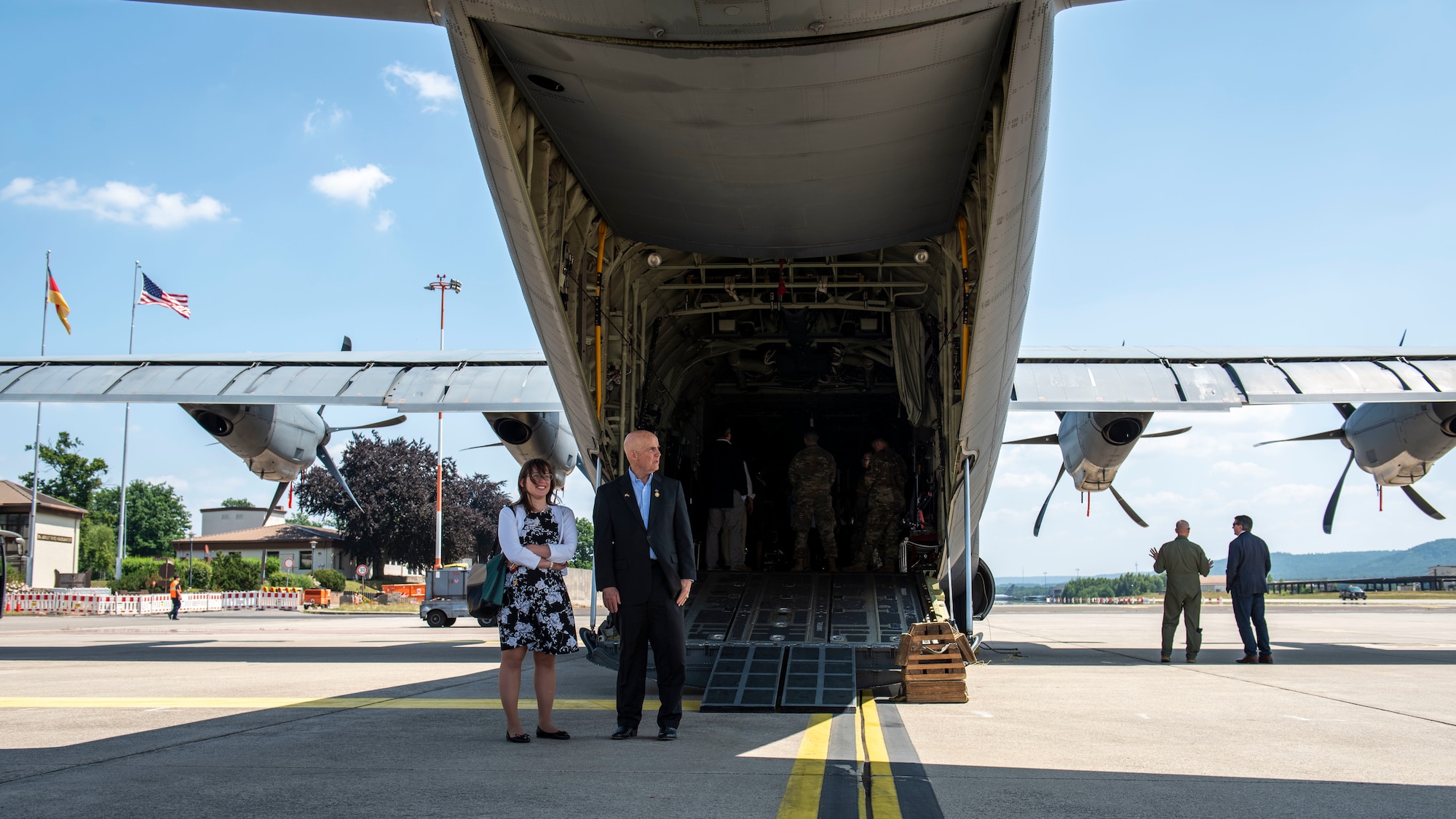 Delegates tour aircraft.