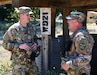 1st Lt. Justin Knowles (left), military intelligence officer, 405th Civil Affairs Battalion, shares a joke with his father Lt. Col. John Knowles Jr, veterinarian, 2nd Medical Training Brigade, Medical Readiness Training Command, June 2, Fort Hunter Liggett, Calif. Both father and son are officers in the Army Reserve and part of Mojave Falcon 25, a multi-faceted first-of-its-kind Army Reserve training exercise that integrates Combat Support Training Exercise, Global Medic, Quartermaster Liquid Logistics Exercise, Port Operations and Nationwide Move. (U.S. Army Reserve Photo by Maj. Alun Thomas, 91st Training Division Public Affairs)