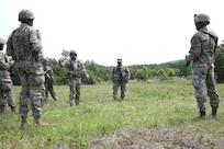 Soldiers with the 1946th Finance Company perform squad movement drills at Fort Indiantown Gap, Pa., June 03, 2025. Squad movement drills are a fundamental soldiering skills, and especially crucial as finance units can be assigned to support various types of units across the Army. (U.S. Army Photo by Spc. Carrol Hughes)