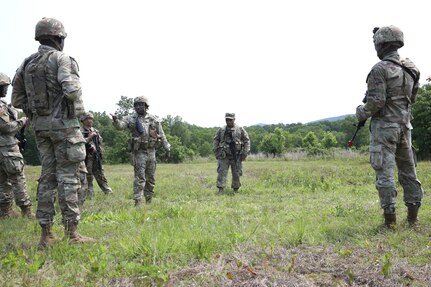 Soldiers with the 1946th Finance Company perform squad movement drills at Fort Indiantown Gap, Pa., June 03, 2025. Squad movement drills are a fundamental soldiering skills, and especially crucial as finance units can be assigned to support various types of units across the Army. (U.S. Army Photo by Spc. Carrol Hughes)