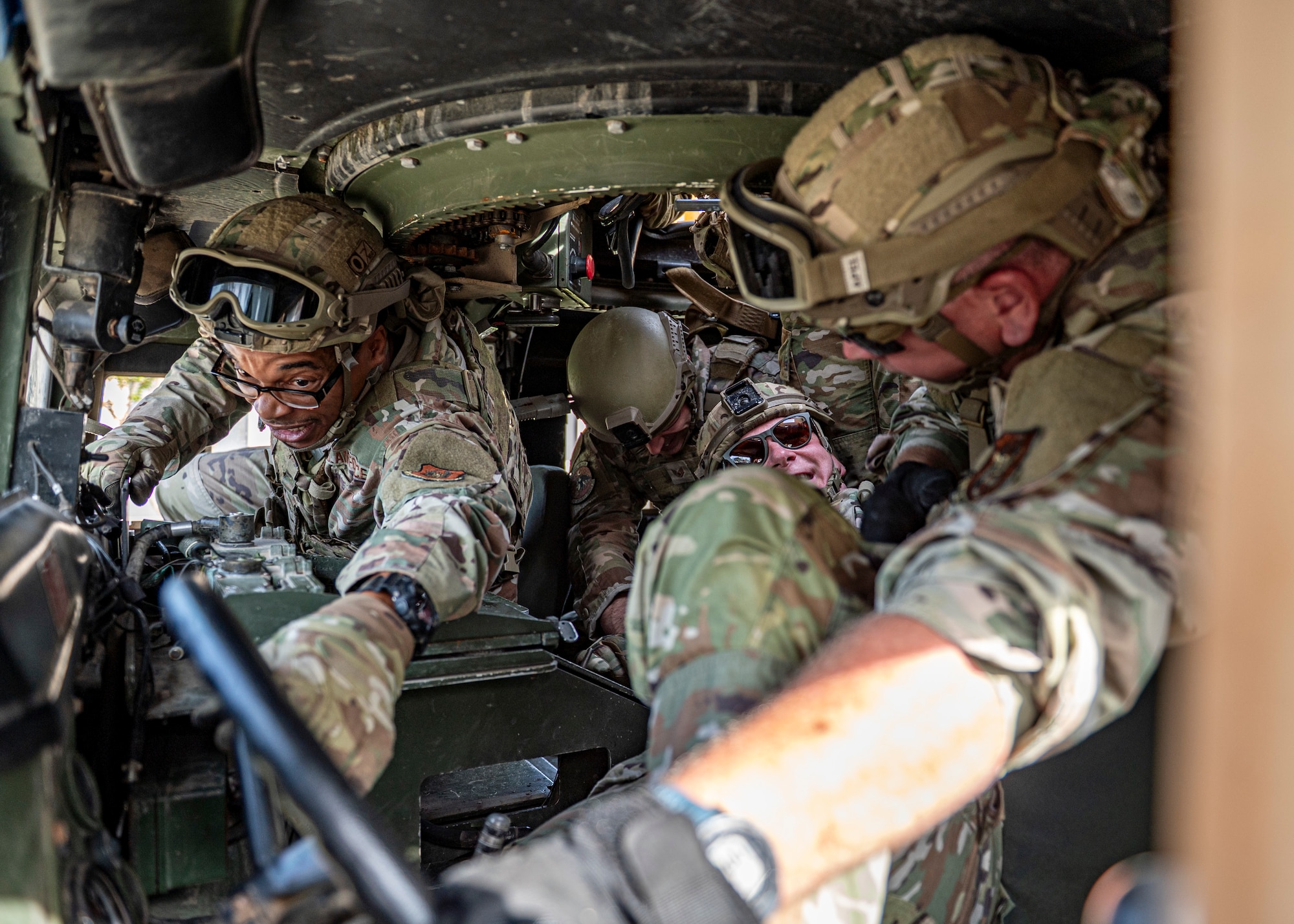 Airmen with the 910th Security Forces Squadron, Youngstown Air Reserve Station, Ohio, perform downed driver training at Moody Air Force Base, Georgia, June 20, 2025. Members of the 910th SFS traveled to Moody to complete their annual tour and focused on combat readiness and tactical skills. (U.S. Air Force photo by Senior Airman Leonid Soubbotine)