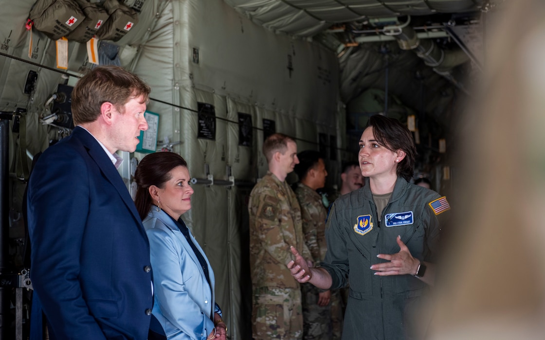 U.S. Air Force Senior Airman Lydia Knight, 37th Airlift Squadron loadmaster, speaks with U.S. congressional delegation members during a visit at Ramstein Air Base, Germany, June 19, 2025. The visit familiarized members of the House Committee on Science, Space and Technology to American interests in the defense, space, aeronautics, science and technology sectors across Central Europe. (U.S. Air Force photo by Senior Airman Sabrina Fuller-Judd)