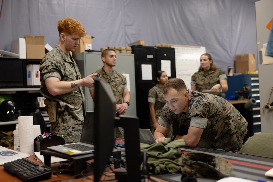 U.S. Marines with Marine Wing Communications Squadron (MWCS) 28, conduct inventory of squadron assets at Marine Corps Air Station Cherry Point, North Carolina, May 22, 2025. MWCS-28 and the Marine Corps Software Factory installed software to digitize their inventory process and streamline the squadron’s accountability for its equipment.