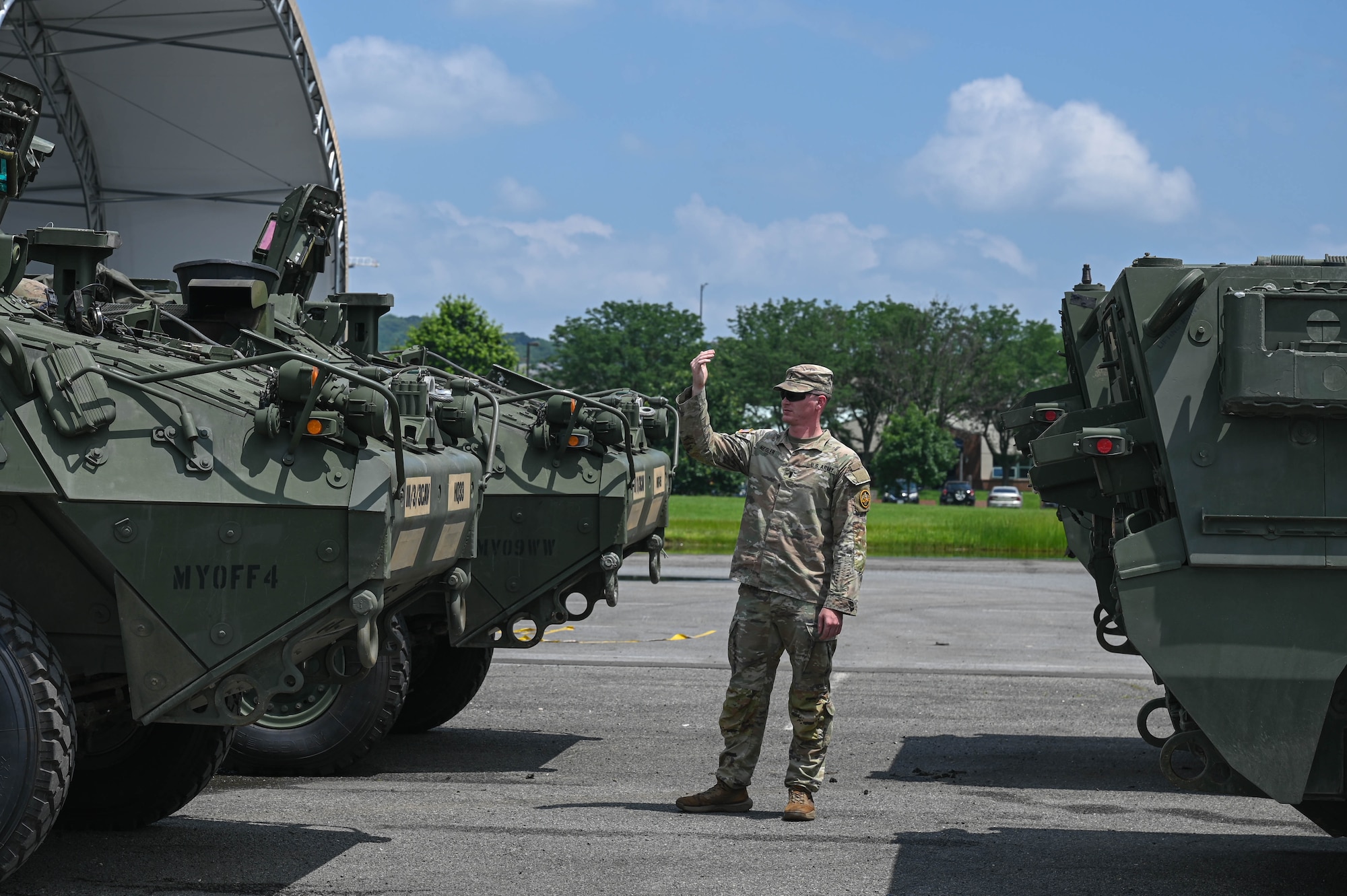 army soldiers move Stryker vehicles