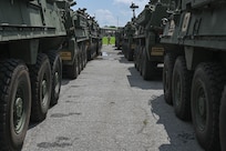 army soldiers move Stryker vehicles