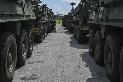 army soldiers move Stryker vehicles
