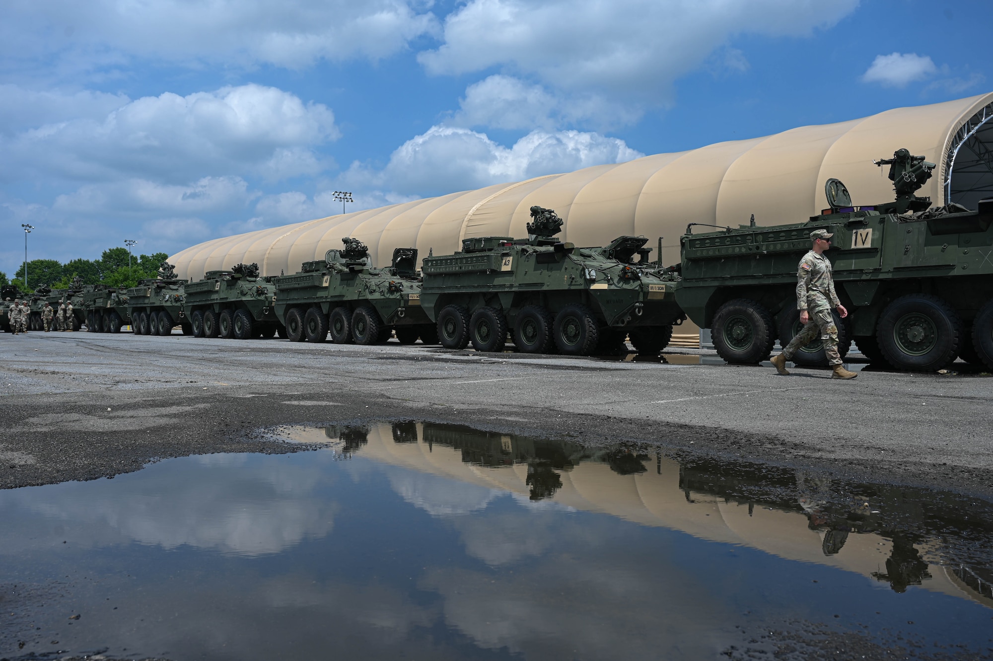 army soldiers move Stryker vehicles