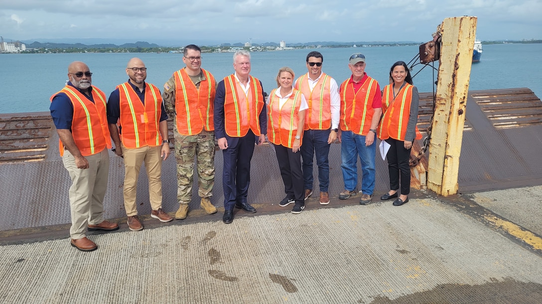 U.S. Congressman Mike Collins (R-Ga.) joins leaders from the U.S. Army Corps of Engineers on June 16, 2025, for a group photo at San Juan Harbor during his visit to the Widening and Deepening Project.