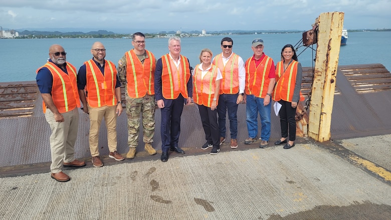 U.S. Congressman Mike Collins (R-Ga.) joins leaders from the U.S. Army Corps of Engineers on June 16, 2025, for a group photo at San Juan Harbor during his visit to the Widening and Deepening Project.