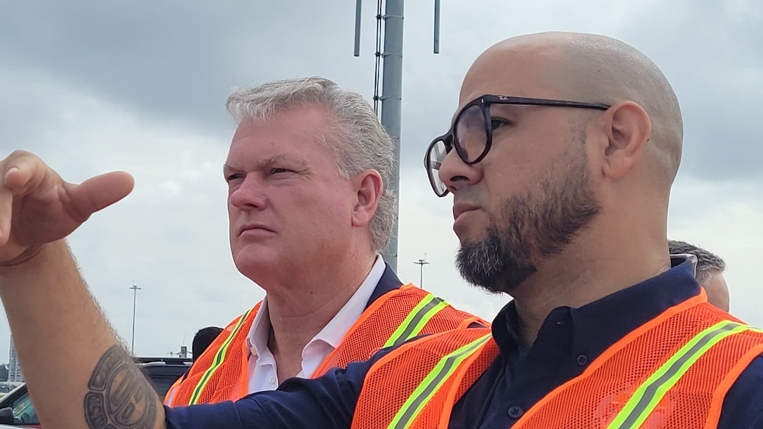 Kiomy Lamb-Mercado (right), Chief of the Caribbean District’s Civil Works Branch, briefs Congressman Mike Collins (R-Ga.) on current and upcoming Army Corps of Engineers projects in Puerto Rico.