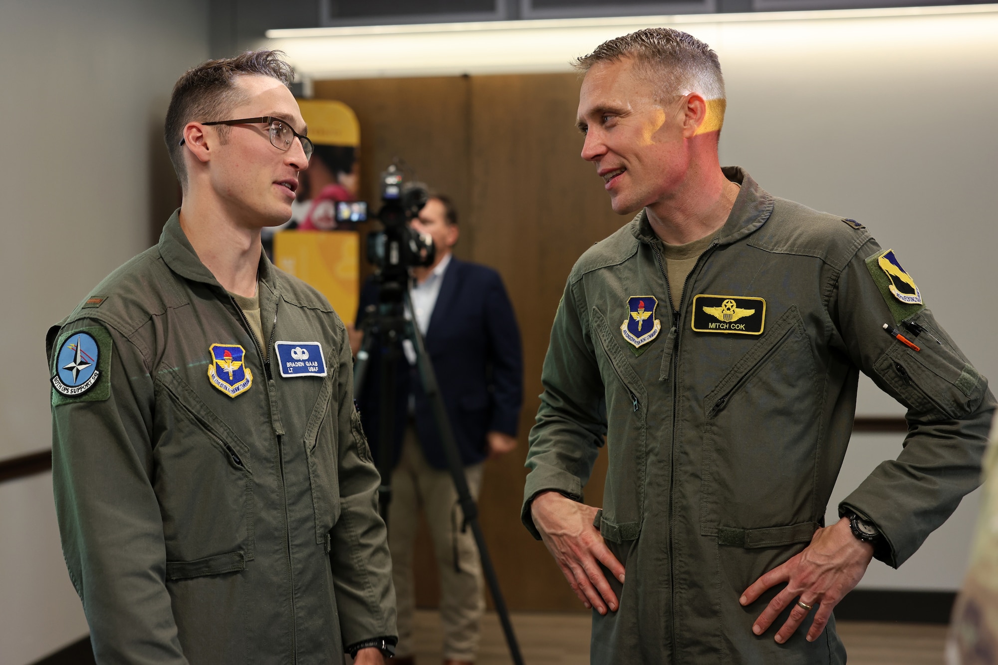 Deputy Commander of the 80th Flying Training Wing Col. Mitchell “Lucky” Cok speaks with a pilot that received a scholarship from Midwestern State University.