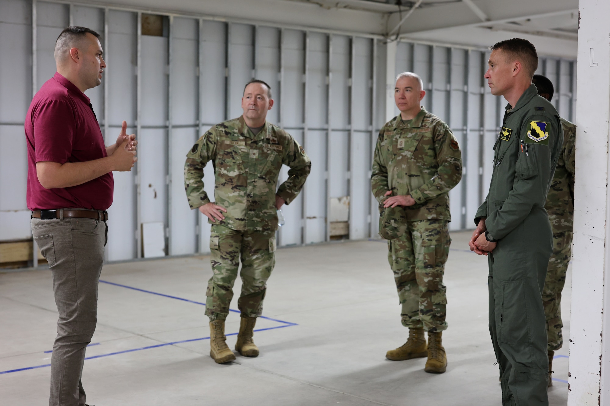 Captain Stephen Schutte gives members of leadership at Sheppard Air Force base a tour of the construction site of the Military Education Center.