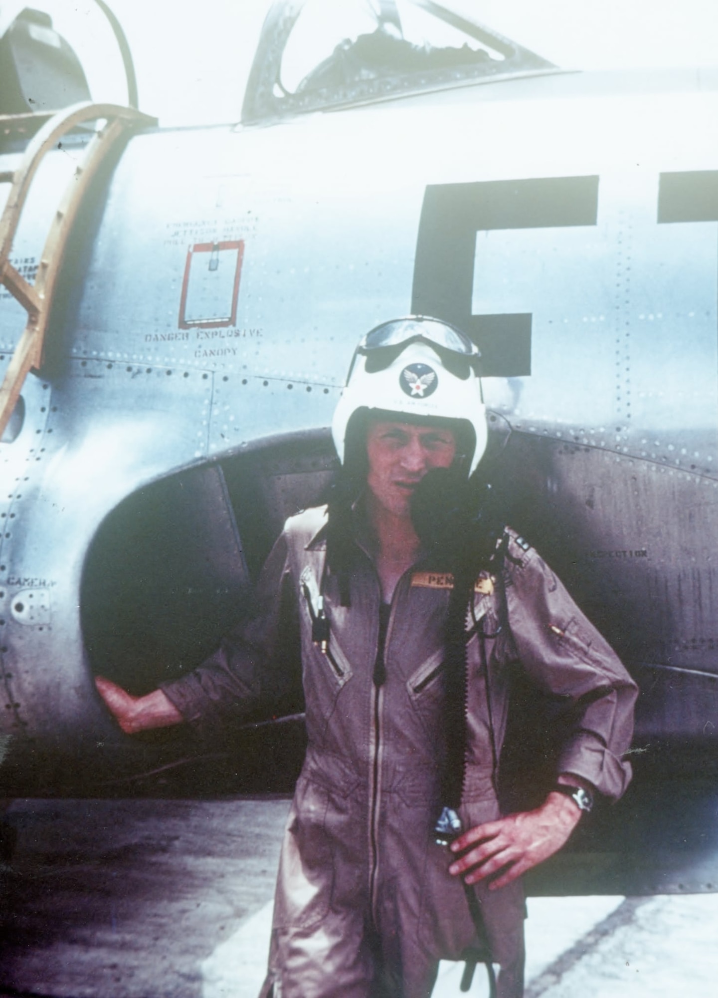 Capt. Richard C. “Dick Penrose stands next to his Lockheed F-80C Shooting Star jet fighter.  A World War II veteran, he was assigned to the 39th Fighter-Interceptor Squadron at Yokota Air Base, Japan when the Korean War began and he again flew combat.  (Photo courtesy of Mr. Jack Cook)