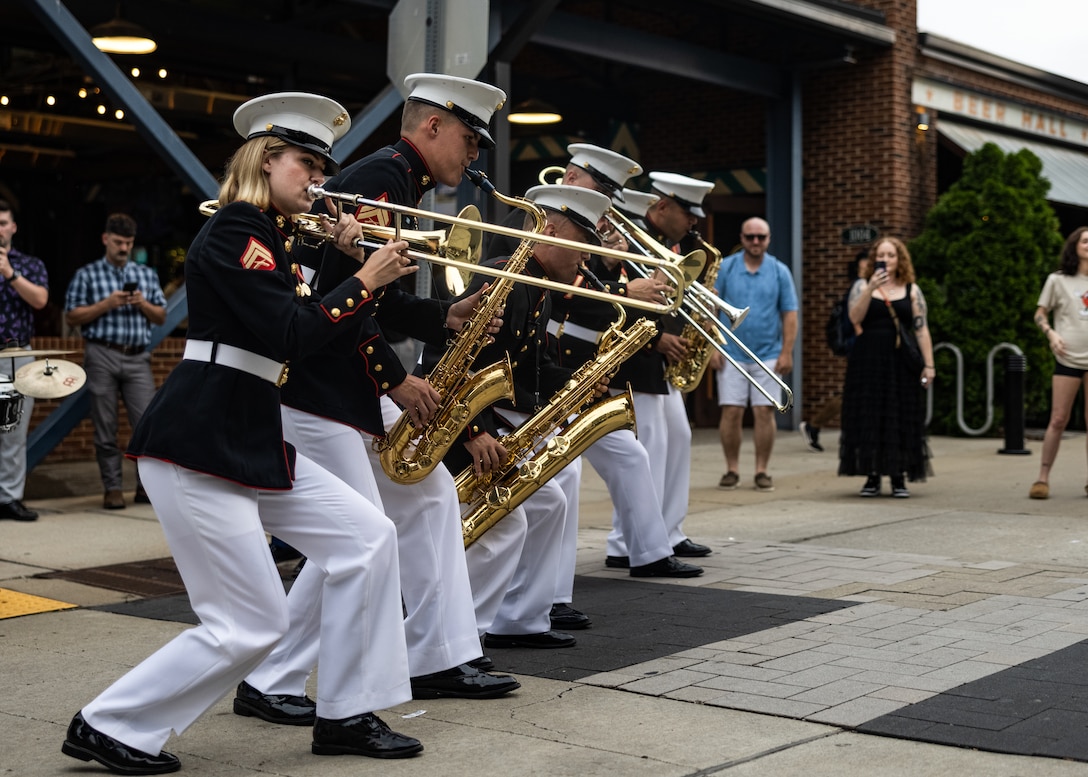 U.S. Marines with 2d Marine Aircraft Wing band, Special-Purpose Marine Air-Ground Task Force 250, perform outside the First Horizon Park as part of Marine Week Nashville, in Nashville, Tennessee, June 6, 2025. First Horizon Park partnered with Marines as a way to show support for the Corps. Throughout 2025, Marines across the globe will celebrate the 250th birthday of the Corps, commemorating service, sacrifice, and priding themselves on living 'Semper Fidelis' or 'Always Faithful' to their nation and to each other. (U.S. Marine Corps photo by Lance Cpl. Judith Ann Lazaro)