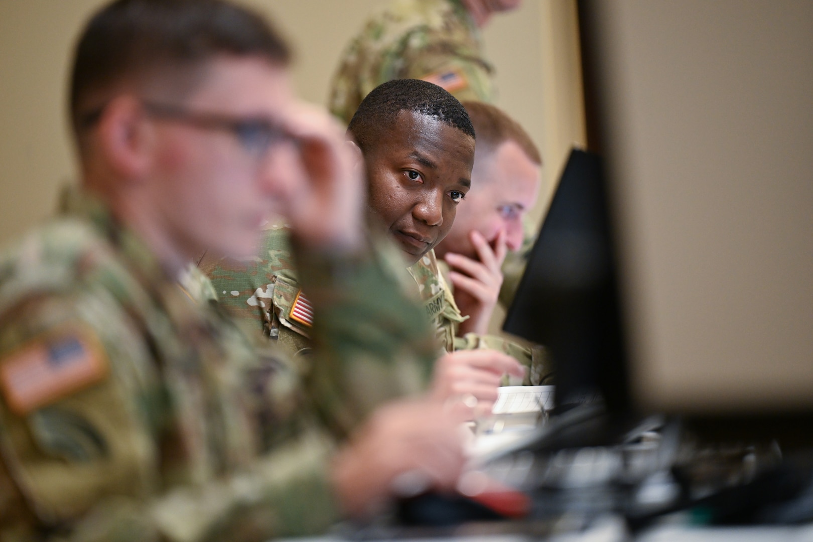 Soldiers assigned to the 153rd Troop Command, New York Army National Guard monitor operations during Exercise Buffalo Falls, June 5, 2025. The Homeland Response Force exercise emphasized rapid coordination across cyber, logistics, and command elements during a simulated domestic crisis.