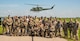 91st Security Forces Group and the 54th Helicopter Squadron pose for a group photo at a missile alert facility outside of Minot Air Force Base, North Dakota, June 17, 2025. 91SFG, 54HS took part in a mass casualty exercise alongside local police and paramedics.