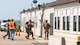 Airmen from the 91st Security Forces Group prepare to enter a building during a mass casualty exercise at a missile alert facility outside of Minot Air Force Base, North Dakota, June 17, 2025. This partnership allows local law enforcement to gain firsthand experience with military procedures during active shooter scenarios.