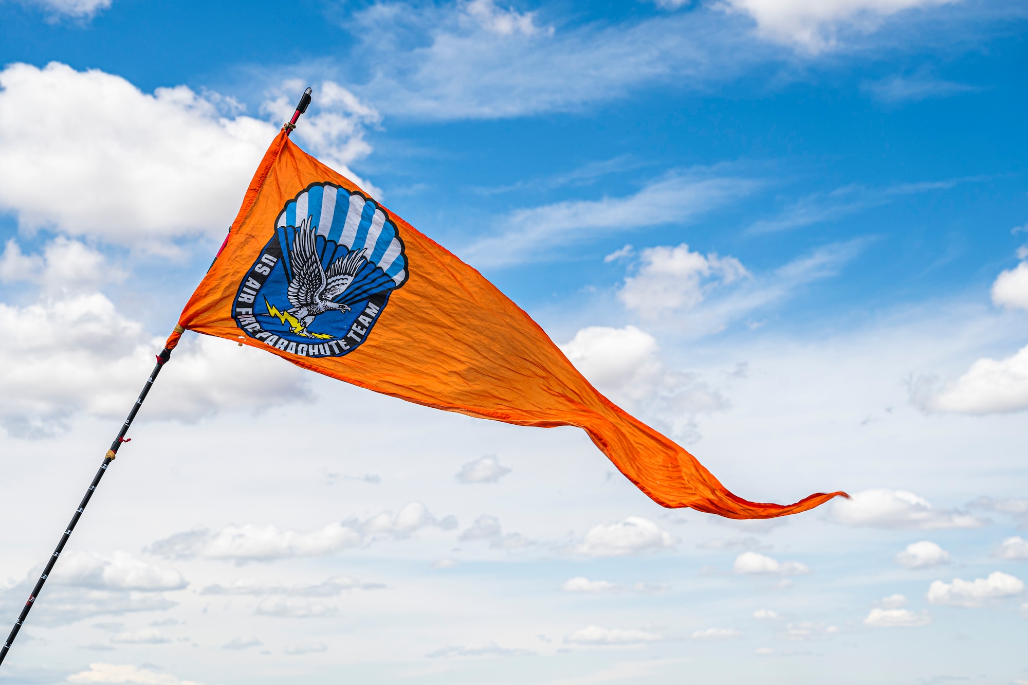 A U.S. Air Force Academy Wings of Blue parachute team pennant flies in the wind during the 2025 Moses Lake Airshow at Grant County International Airport, Washington, June 20, 2025.