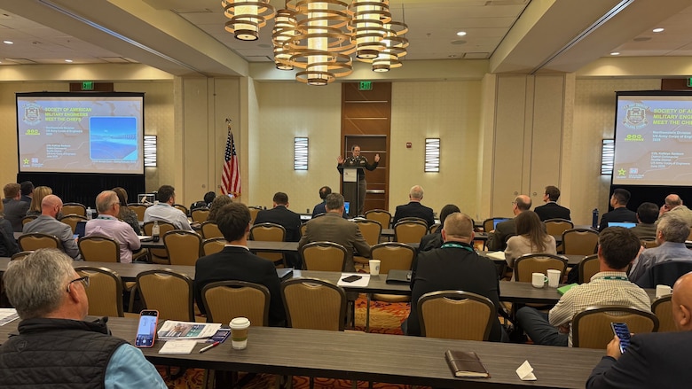 Col. Kathryn Sanborn, commander of the U.S. Army Corps of Engineers, Seattle District, delivers a mission briefing at Society of American Military Engineers (SAME) Northwest Posts Meet the Chiefs 2025 Regional Event on June 17, at the Seattle Airport Marriott, emphasizing the critical role of small businesses in delivering infrastructure solutions across the Pacific Northwest. SAME provides a professional platform for collaboration, technical exchange, and problem-solving—helping the Seattle District stay ahead of emerging threats and engineering demands through shared best practices and innovations.