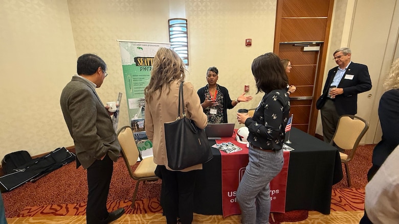Enshanè Nomoto-Hill, small business professional, U.S. Army Corps of Engineers, Seattle District speak with small and large industry professionals during the Society of American Military Engineers (SAME) Northwest Posts Meet the Chiefs 2025 Regional Event on June 17, at the Seattle Airport Marriott. SAME bring together military and civilian professionals to strengthen partnerships, enhance resilience, and support the future of the engineering workforce. SAME is a trusted partner in this mission—bringing industry and government together to support readiness, resilience, and technical excellence. SAME members provide insights, innovation, and expertise that strengthen the district’s capacity to deliver on time and on budget.