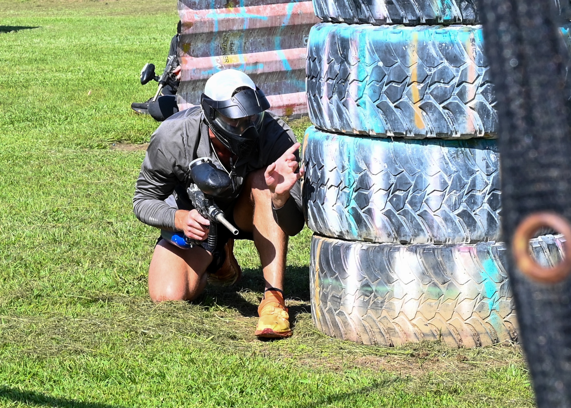 U.S. Air Force 1st Lt. John Putman, 42nd Contracting Squadron officer in charge of the defense education flight, engages the enemy team in a paintball game during a resiliency and readiness paintball exercise in Wetumpka, Alabama, June 20, 2025.
