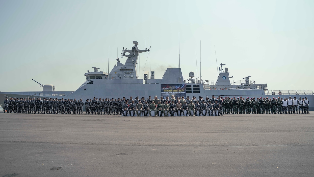 U.S. Navy and Indonesian Navy personnel pose for a photo after the opening ceremony of Cooperation Afloat Readiness and Training (CARAT) Indonesia 2025 at Tentara Nasional Indonesia Angkatan Laut (TNI-AL) headquarters in Surabaya, Indonesia, June 23, 2025.