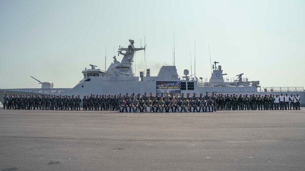 U.S. Navy and Indonesian Navy personnel pose for a photo after the opening ceremony of Cooperation Afloat Readiness and Training (CARAT) Indonesia 2025 at Tentara Nasional Indonesia Angkatan Laut (TNI-AL) headquarters in Surabaya, Indonesia, June 23, 2025.