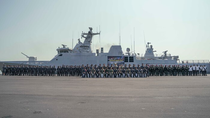 U.S. Navy and Indonesian Navy personnel pose for a photo after the opening ceremony of Cooperation Afloat Readiness and Training (CARAT) Indonesia 2025 at Tentara Nasional Indonesia Angkatan Laut (TNI-AL) headquarters in Surabaya, Indonesia, June 23, 2025.