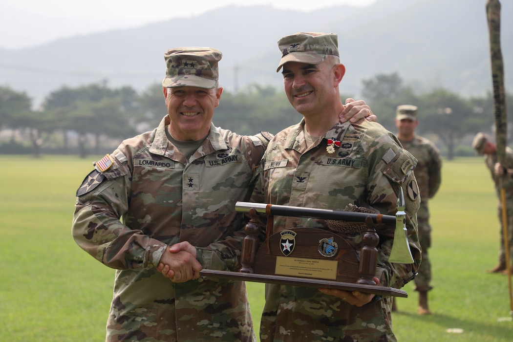 Maj. Gen. Charles Lombardo, commanding general of the 2nd Infantry Division/ROK-U.S. Combined Division and Col. Christopher S. Nunn, Commander of 1st Stryker Brigade Combat Team are pictured during a Transfer of Authority ceremony, on Camp Casey, South Korea, June. 18, 2025.