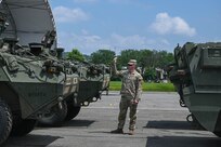 army soldiers move Stryker vehicles